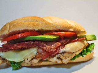 Chicken fillet with cheese and prosciutto in bun Amos picerija delivery