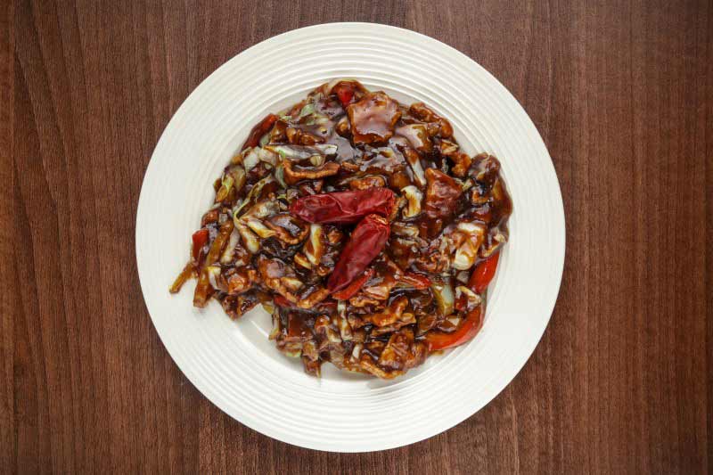 Spicy pork with onion and chili paprika delivery