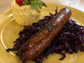 Slovak sausages with stewed cabbage and polenta with cheese Restoran Veliki delivery