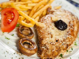 Stuffed grilled chicken with French fries delivery