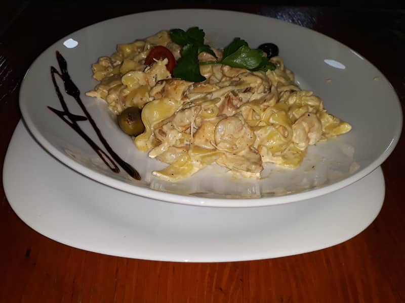 Pasta chicken fillet, curry, neutral cream, parmesan delivery