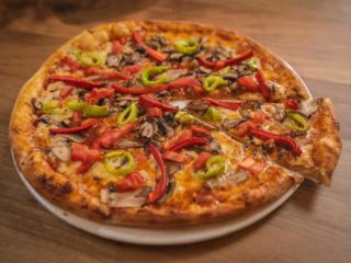 Vegetariana pizza Rustico delivery