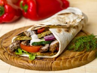 Falafel  and  shawarma dejaj sandwich Byblos Express delivery