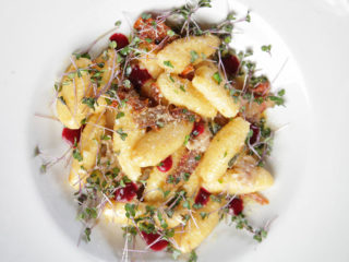 Goat cheese gnocchi in sun dried tomato, bacon, sage and peperoncino sauce Lorenzo i Kakalamba delivery