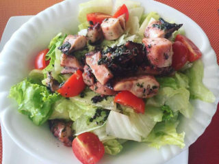 Salad with octopus and cheery tomato Godo Splav Restoran delivery