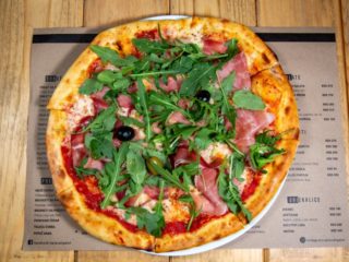 Prosciutto, rocket pizza Aligator Bar delivery