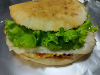 Chicken breasts with cheese in bun Amos picerija delivery