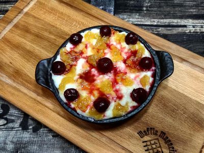 Rum rice pudding with red fruit Waffle magacin delivery