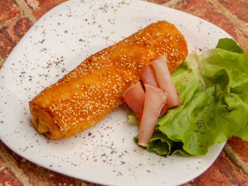 Fried pancake with prosciutto delivery