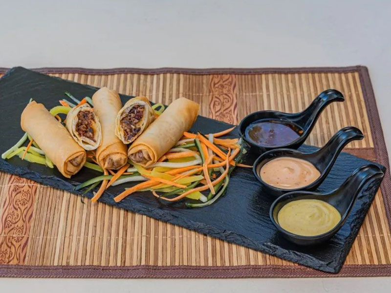 Warm spring rolls with meat and vegetables delivery