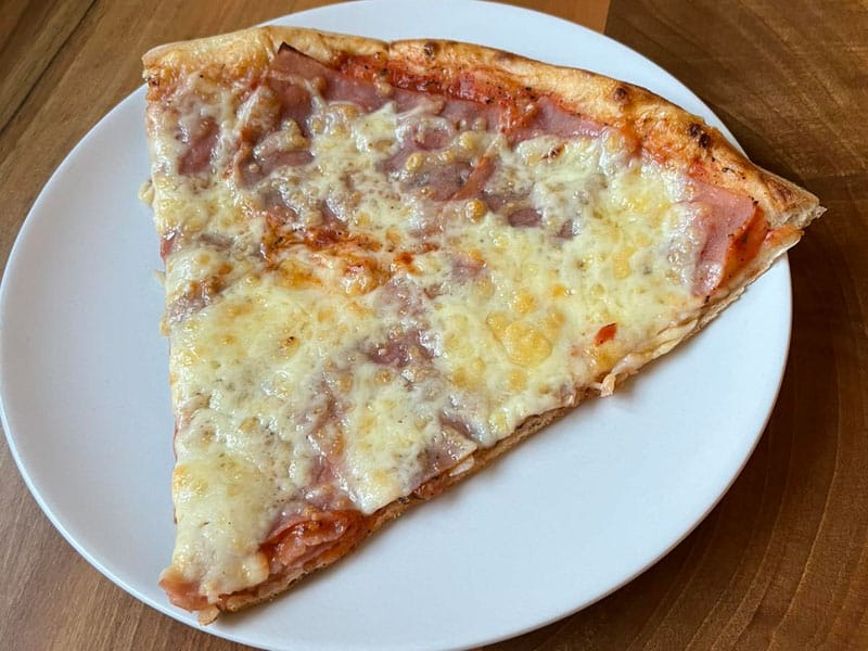 Capricciosa pizza slice delivery