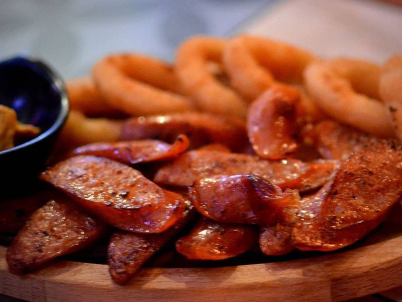 Beer sausage and onion rings delivery