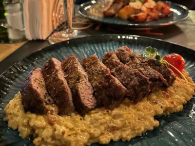 Beef tagliata with rice and pumpkin cream with prosciutto Trioss Gastro Bar delivery