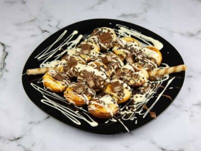 Mini donuts with white chocolate - 12 pcs M&S Sweet House delivery