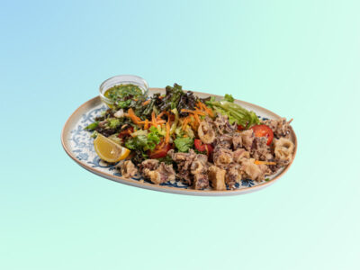 Fried squids on colorful salad Filtz delivery