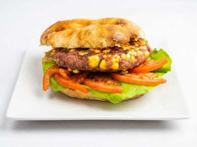 Gourmet pljeskavica in a bun Njuškica Fast Food delivery