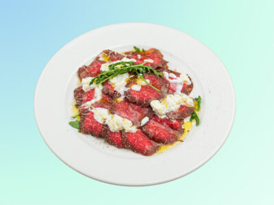Beef carpaccio on arugula Filtz delivery