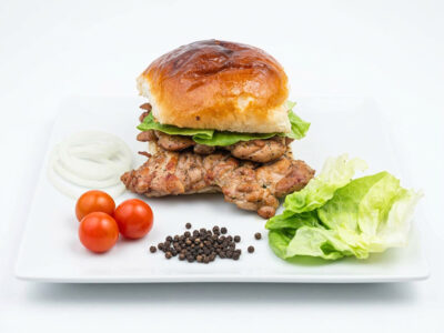 Smoked stuffed durmstick in a bun Njuškica Fast Food delivery