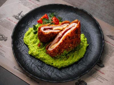 Turkey in crunchy almonds on peas puree Balkan Distrikt delivery