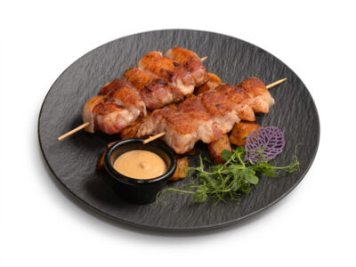 Main meal – Chicken skewer in bacon Giardino L'Osteria delivery