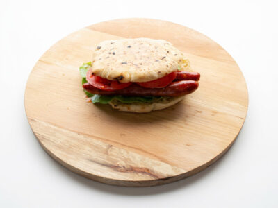 Grill sausage fresh in flatbread Rumski Roštilj delivery