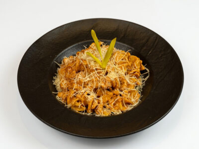 Pasta with chicken and peanuts Giardino L'Osteria delivery