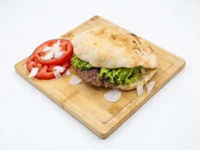 Banjalucka pljeskavica in a bun Gurmanska Priča delivery