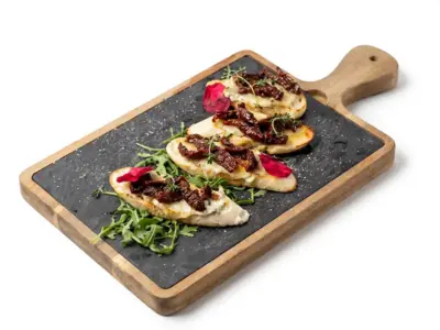 Bruschetta with gorgonsola and dried tomato Korzo Gastro Bar delivery