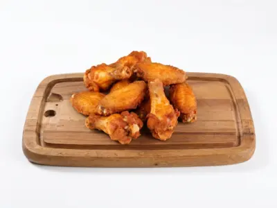 Crispy chicken wings with fries Jules Verne delivery