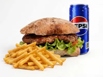 Leskovac pljeskavica 220g + French fries 200g + Pepsi 0.33L Kruna Leskovački Roštilj delivery