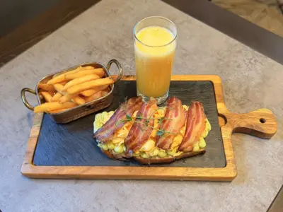 Scrambled eggs on sourdough bread Balkan Distrikt delivery